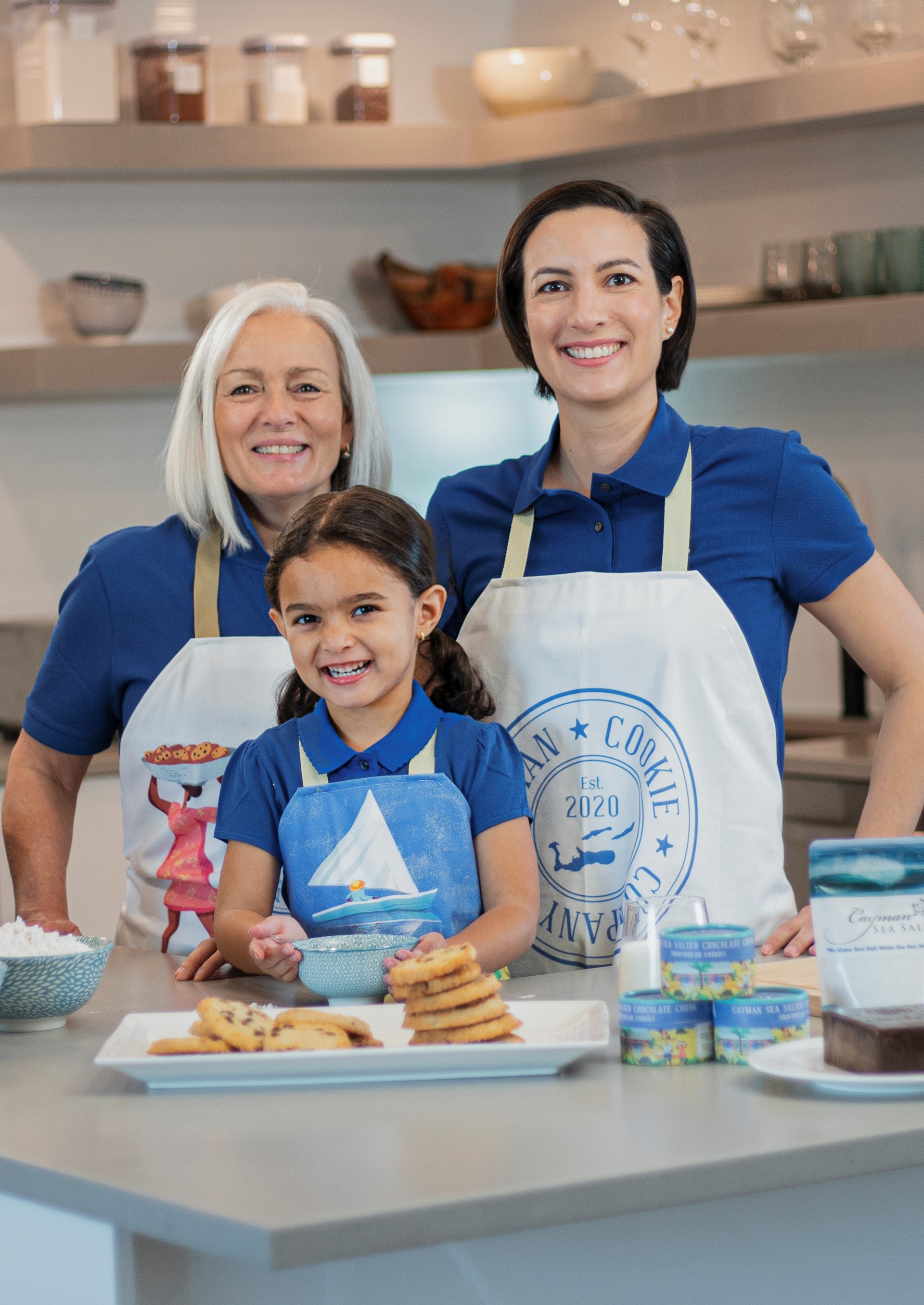generations of women baking cookies