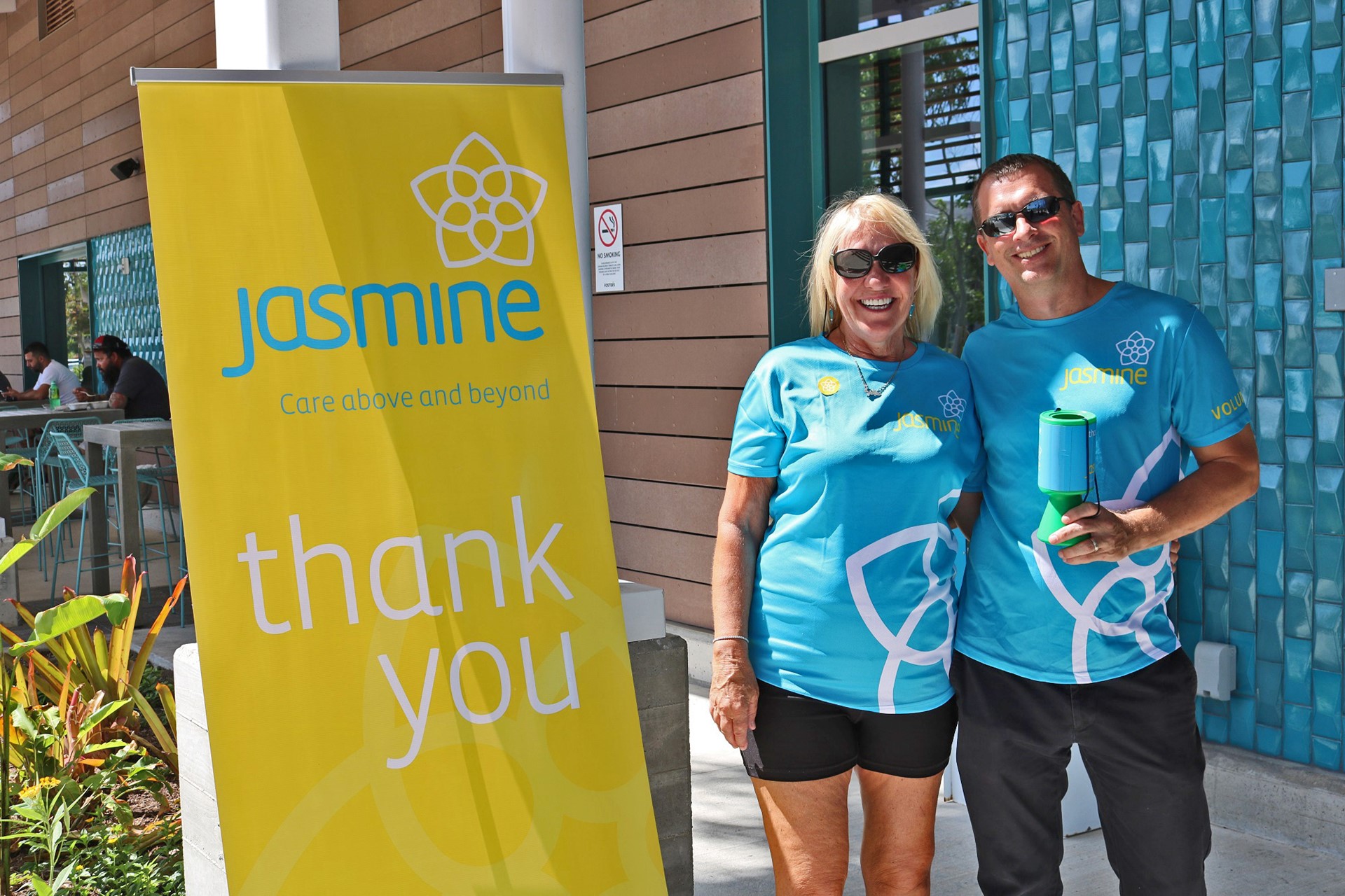volunteers collecting coins for Jasmine