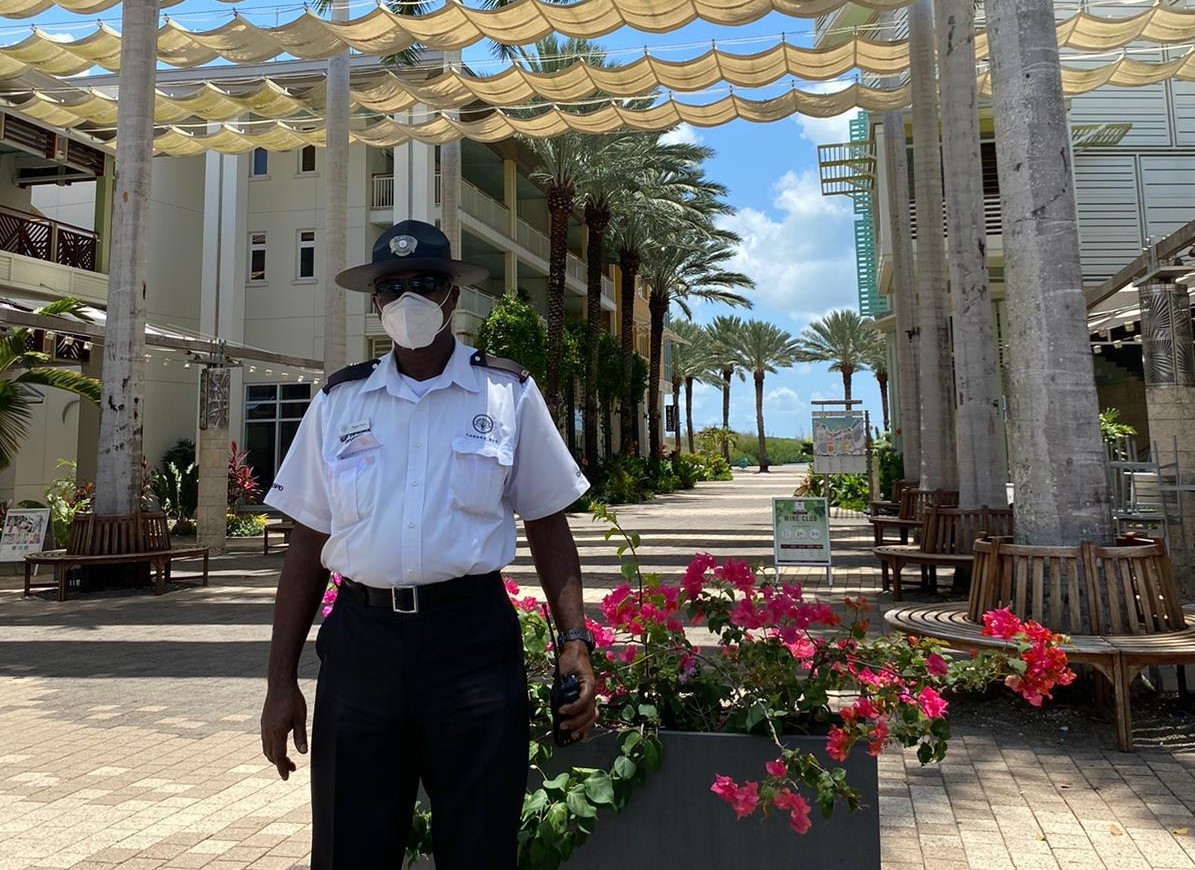 Service with a mask-covered smile: Camana Bay’s service businesses endure