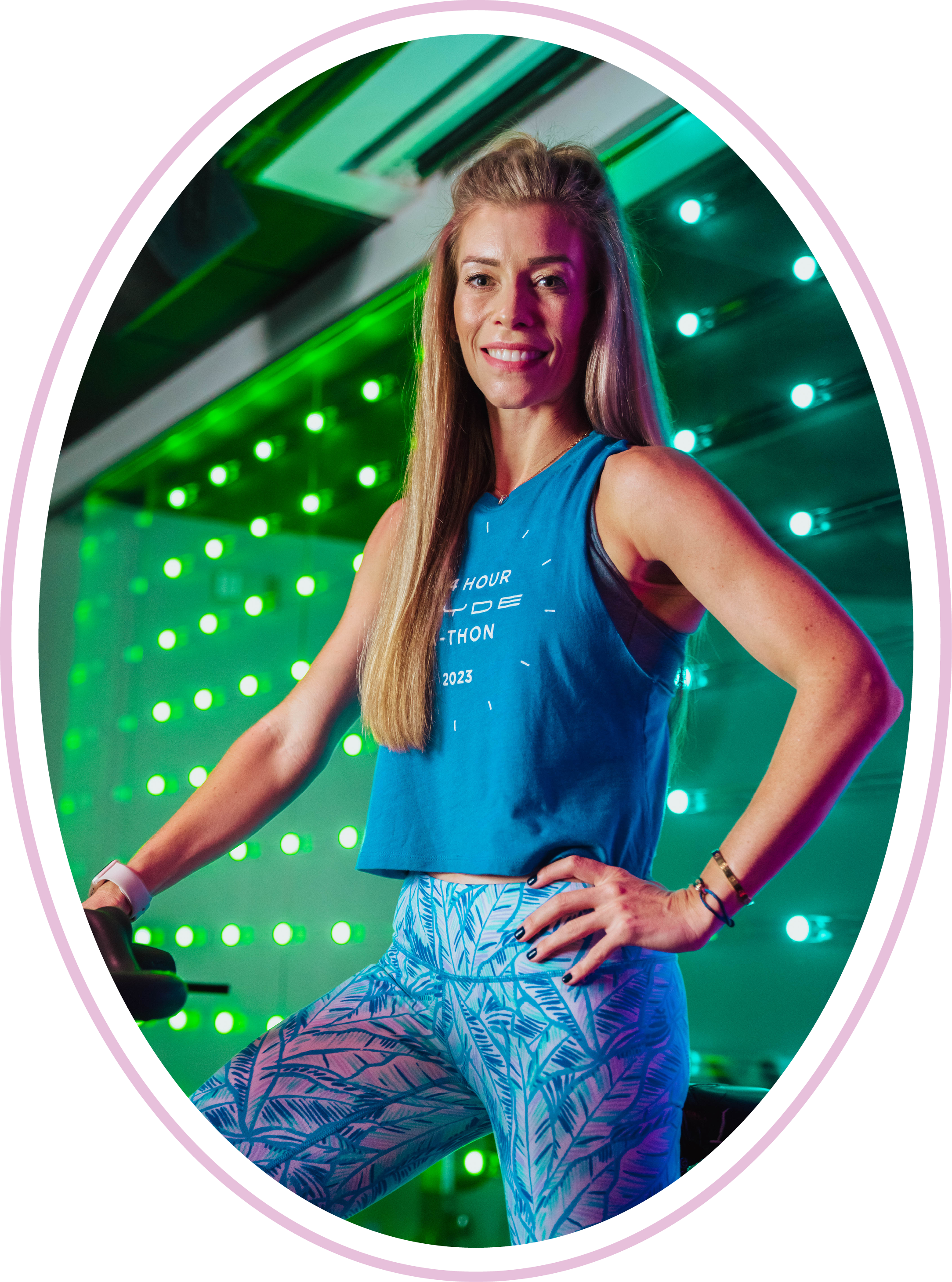 Woman poses on stationary bike