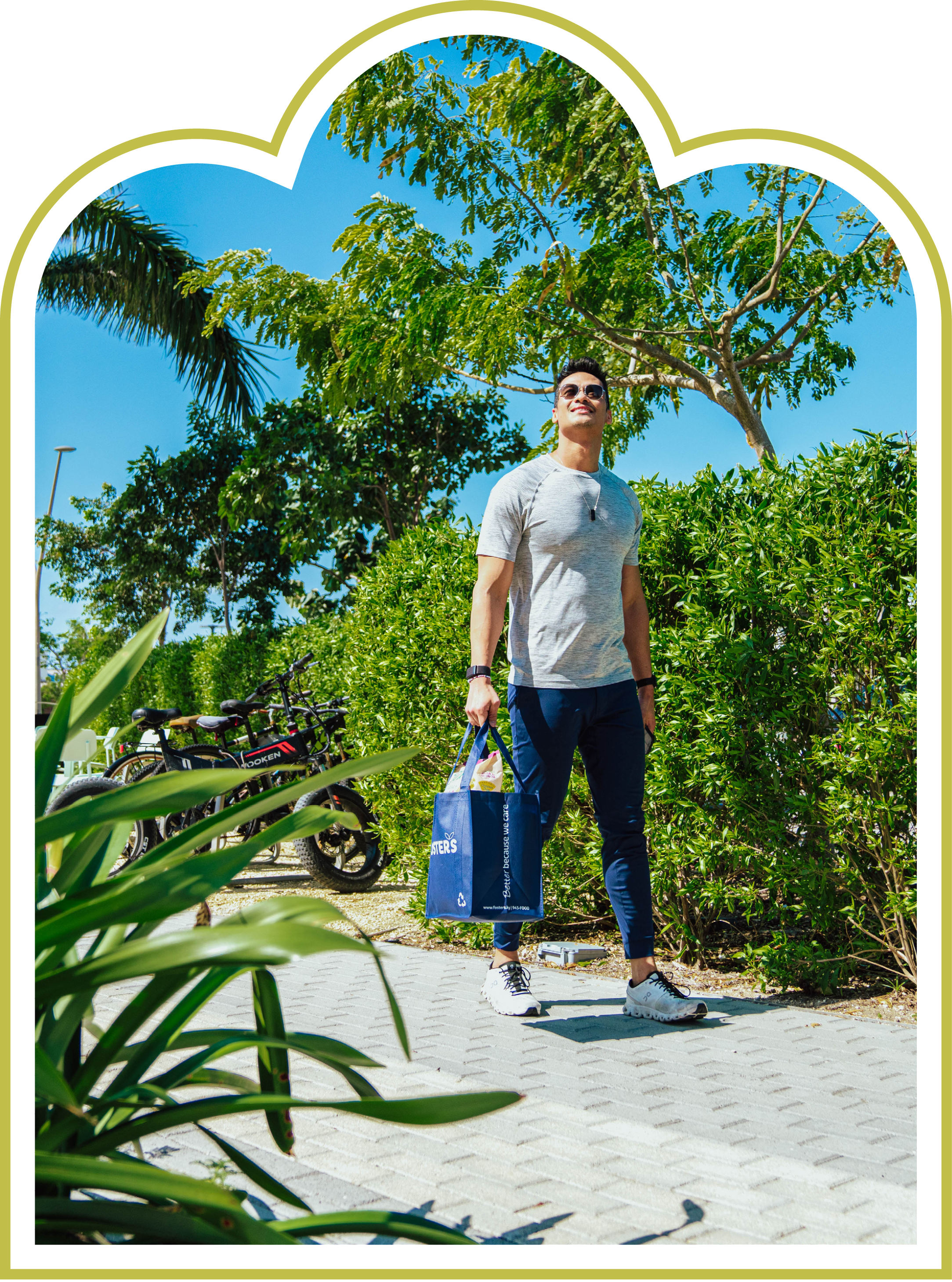 Man walking with reusable shopping bag