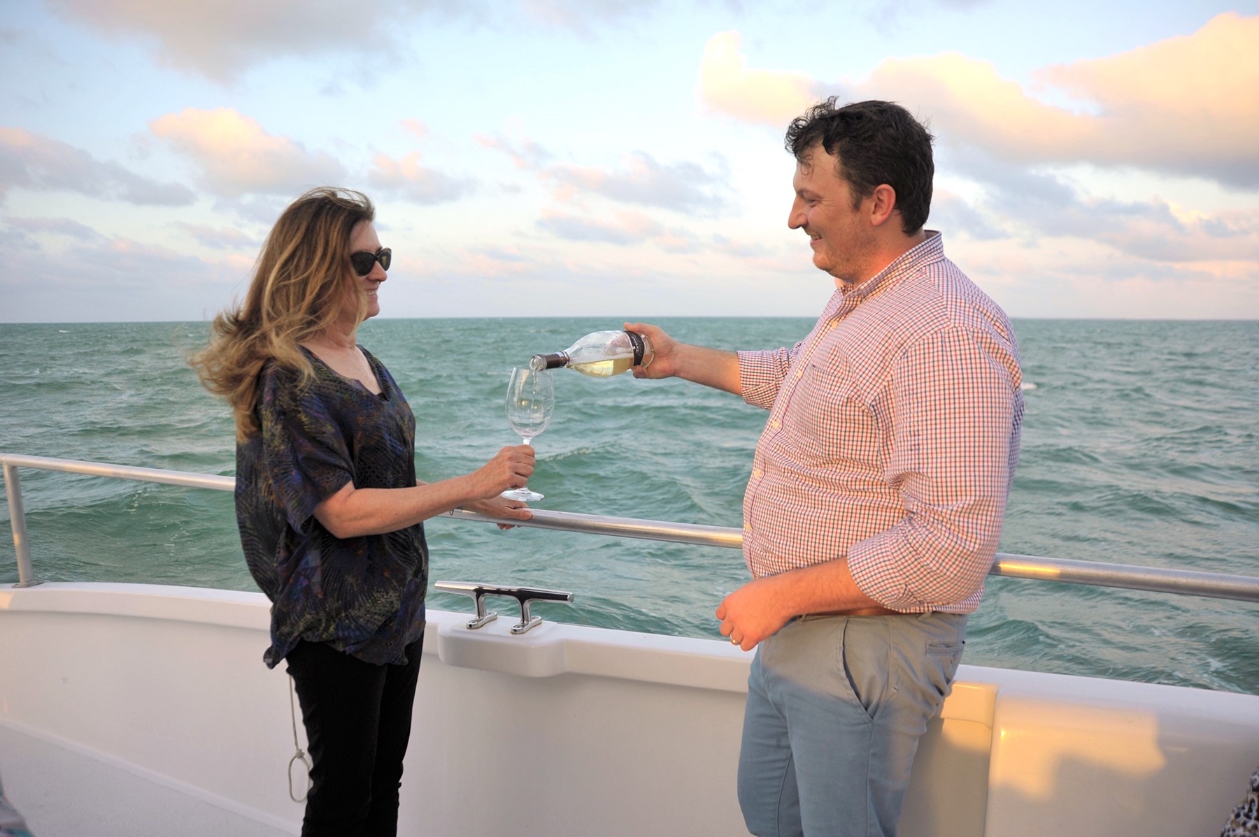 A wine pairing sunset sail in Camana Bay