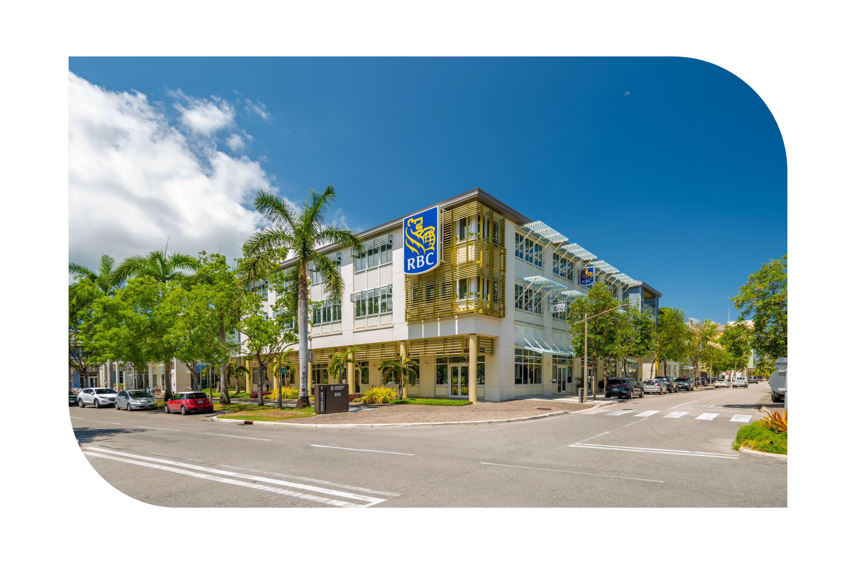 RBC building against a bright blue sky at 9 Forum Lane in Camana Bay 