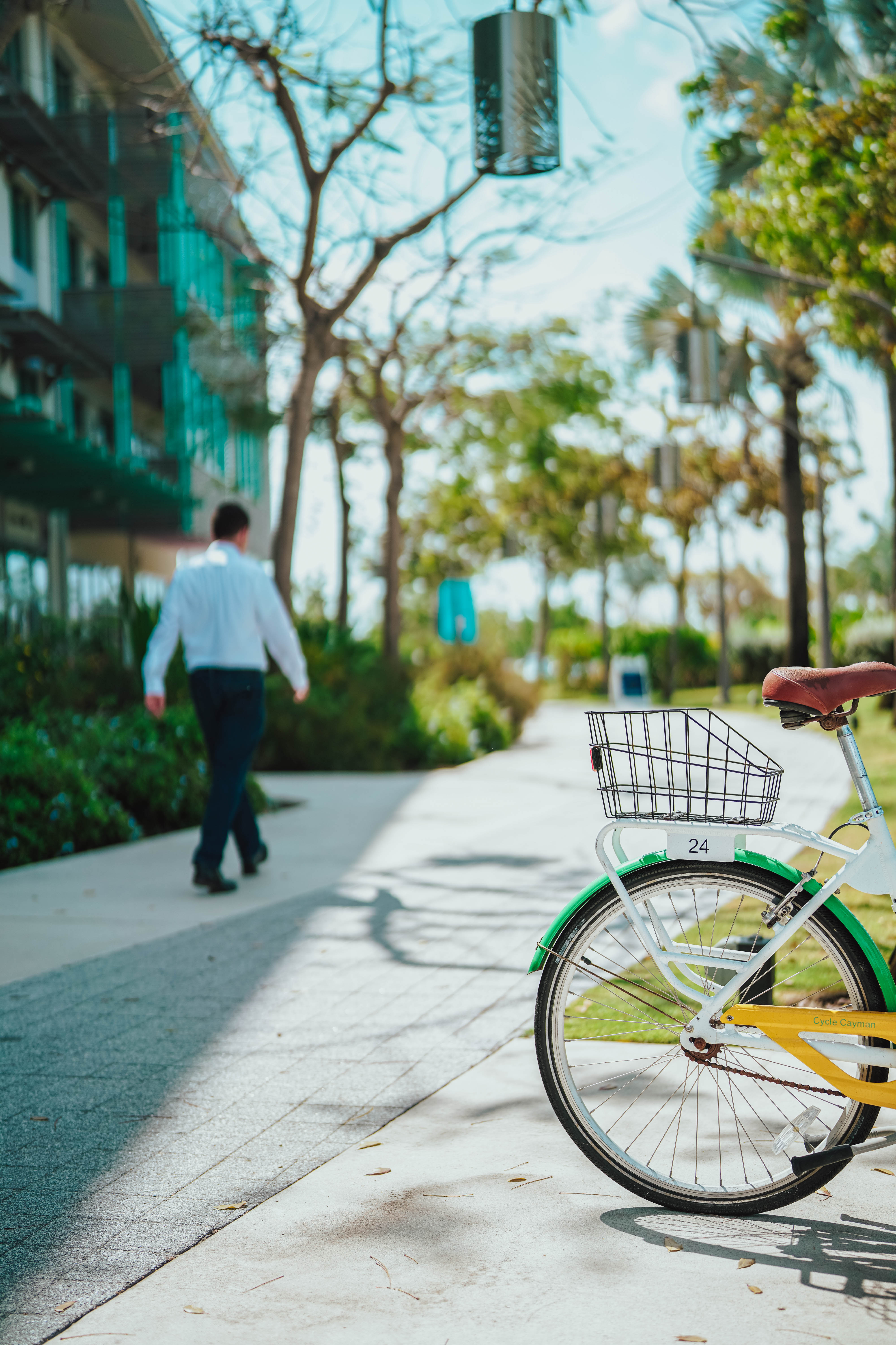 Man walking a bicycle