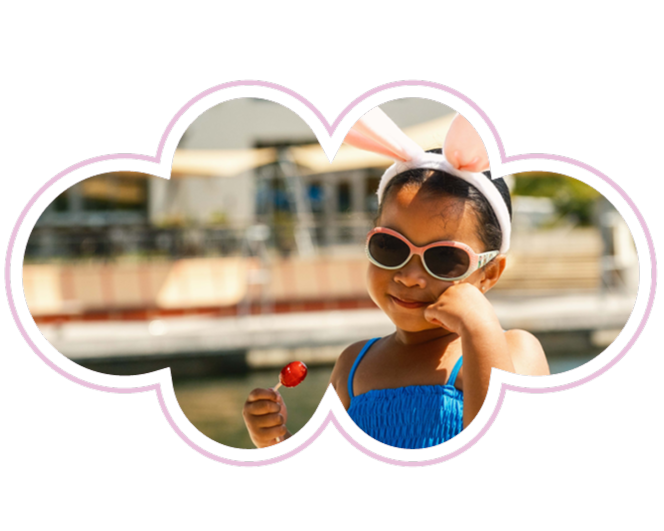 Girl with bunny ears smiling