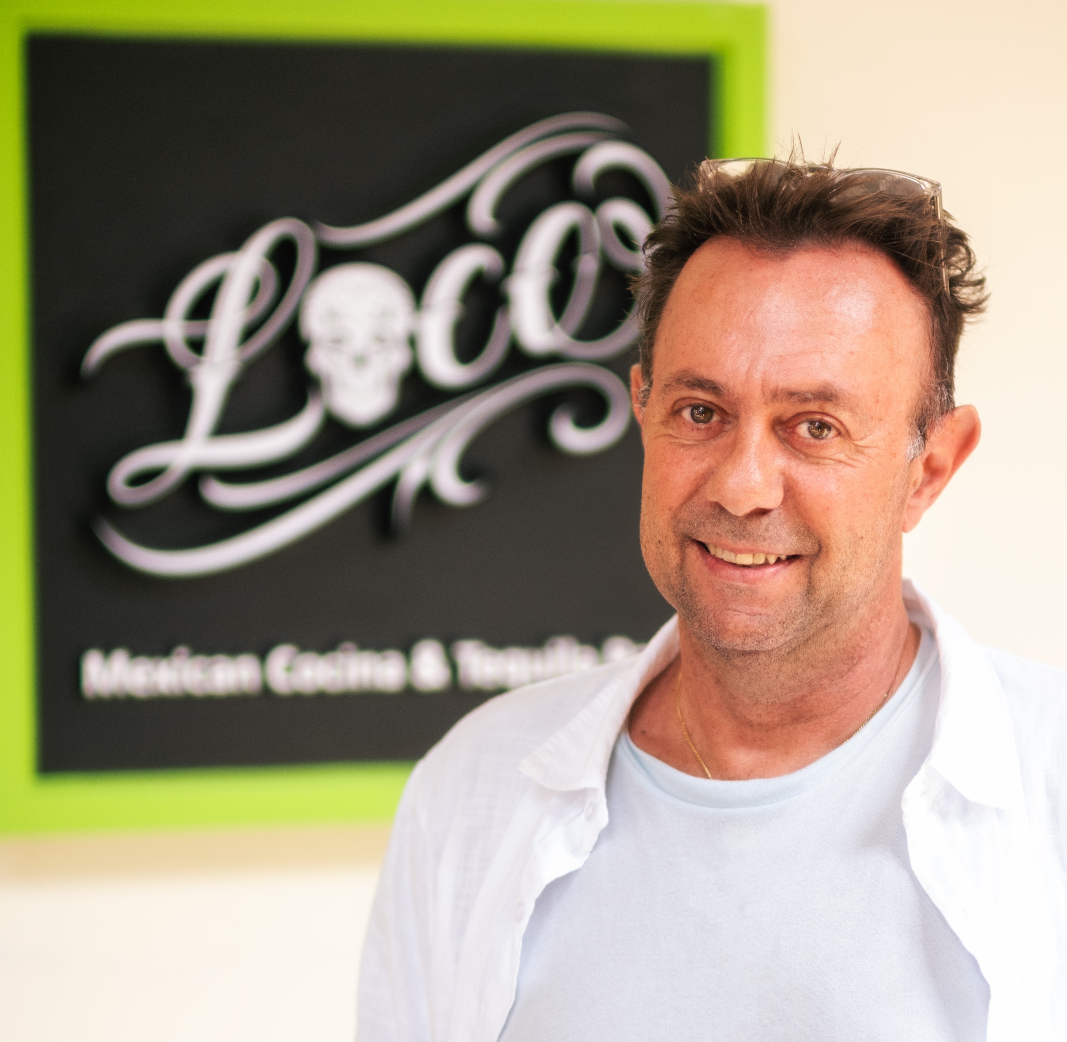 Man smiles at camera