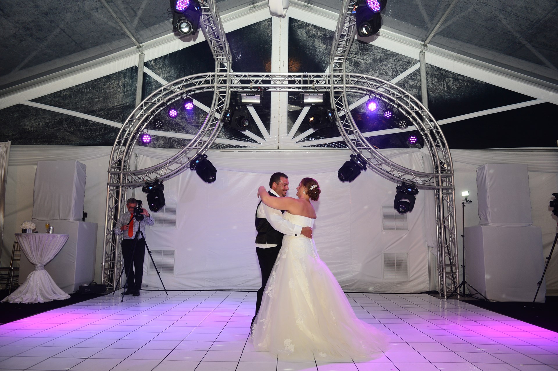 Bride and groom dancing together