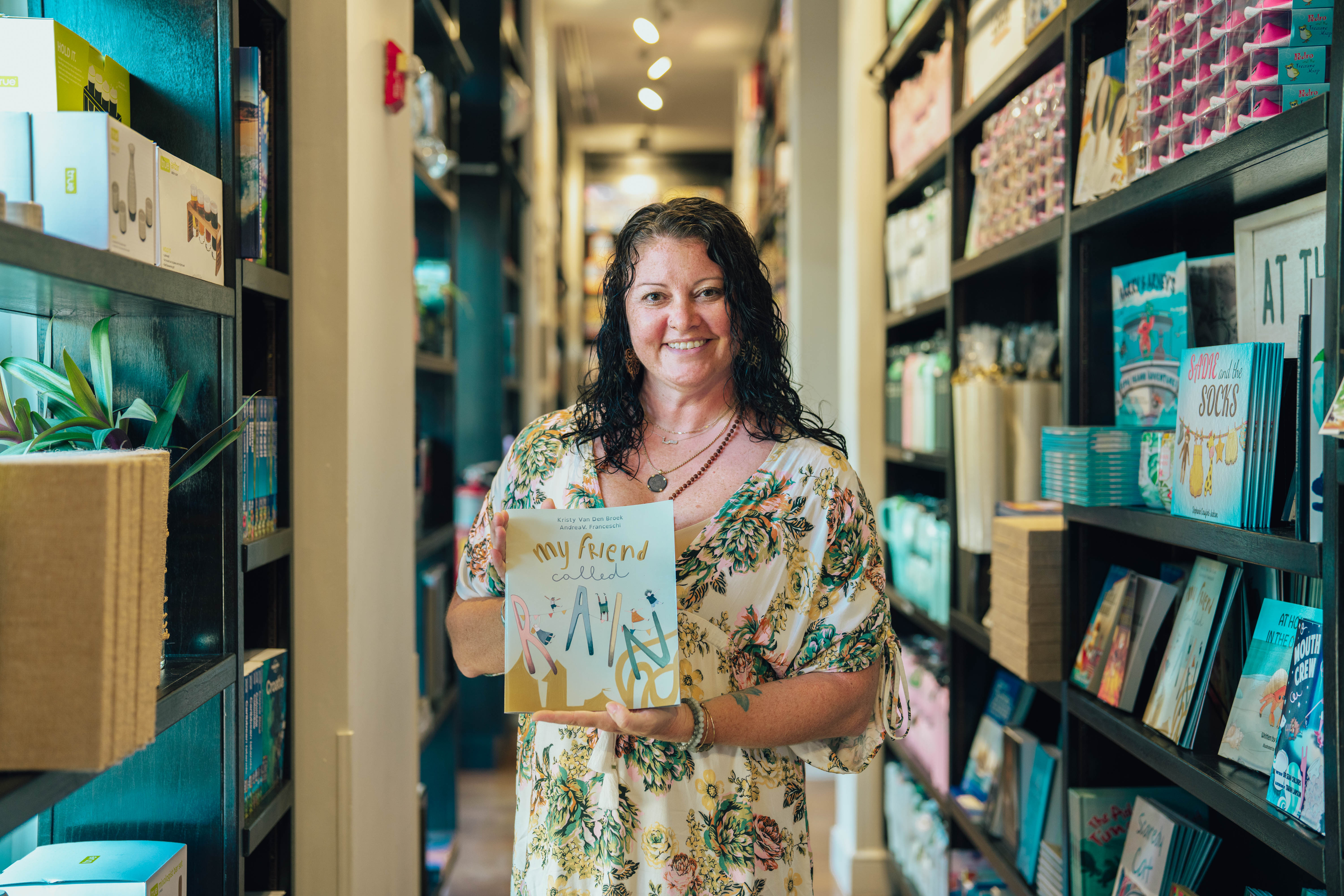 Woman holding children's book